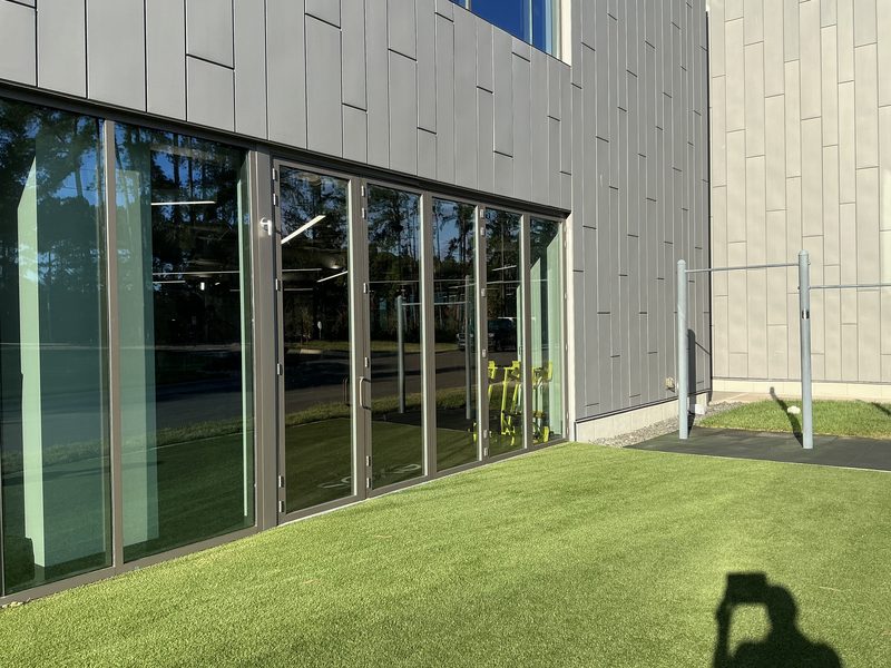 Eleven foot tall folding glass wall at 5 Lab