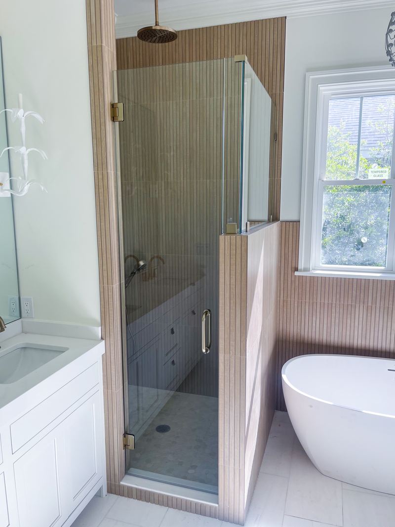Shower Glass beside a Freestanding Tub