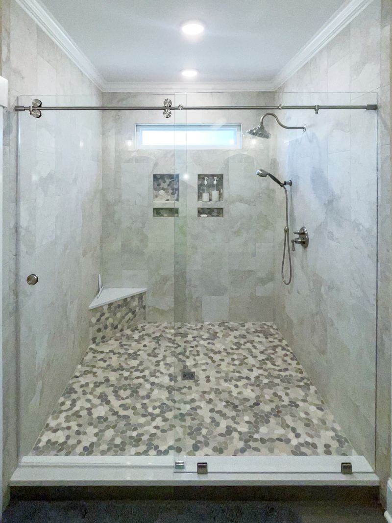 Marble Shower with Pebble Floor