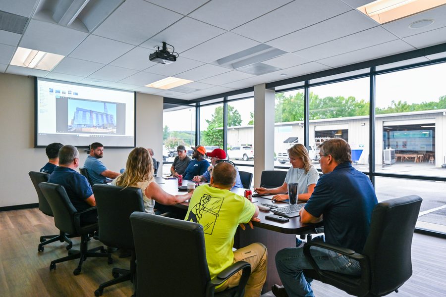 A Brinn Glass commercial team meeting